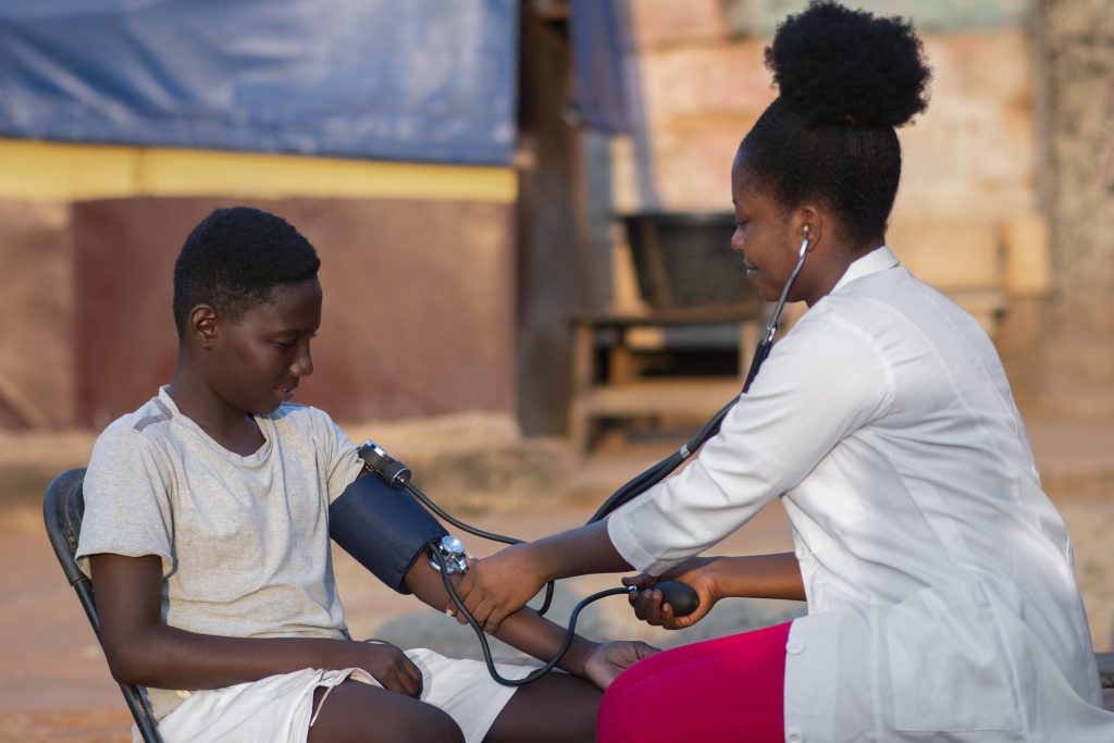 africa humanitarian aid doctor taking care patient